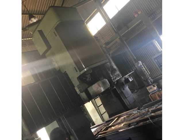 "Okuma" Cnc Double Column Machine Center Year 1991 Model MCV16A Control OSP 5020 M Table Size 2,100 × 1,200 mm. "Okuma" Cnc Double Column Machine Center Year 1991 Model MCV16A Control OSP 5020 M Table Size 2,100 × 1,200 mm.